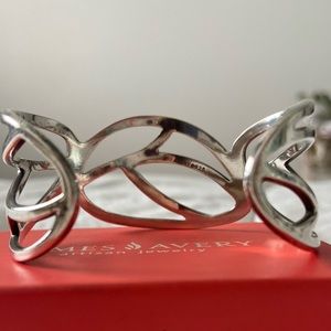 Retired open leaf cuff